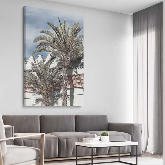Floral print of Marrakesh Palms on a stretched canvas displayed from an angle in a room