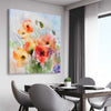 Floral print of Red Watercolour Poppies on a stretched canvas displayed from an angle in a room