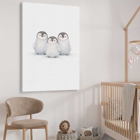 Little Penguin Trio stretched canvas displayed from an angle in a room is a nursery canvas wall art and print suited for childrens nursery area