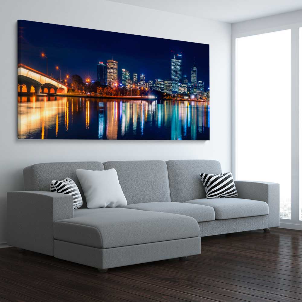 Perth Skyline Glow stretched canvas displayed from an angle in a room is a high quality print in our city skyline, travel prints and maps collection