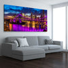 Story Bridge Glow stretched canvas displayed from an angle in a room is a high quality print in our city skyline, travel prints and maps collection