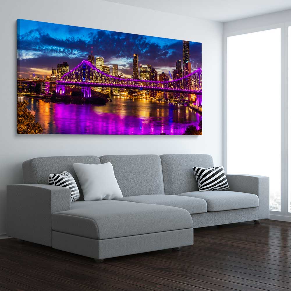 Story Bridge Glow stretched canvas displayed from an angle in a room is a high quality print in our city skyline, travel prints and maps collection