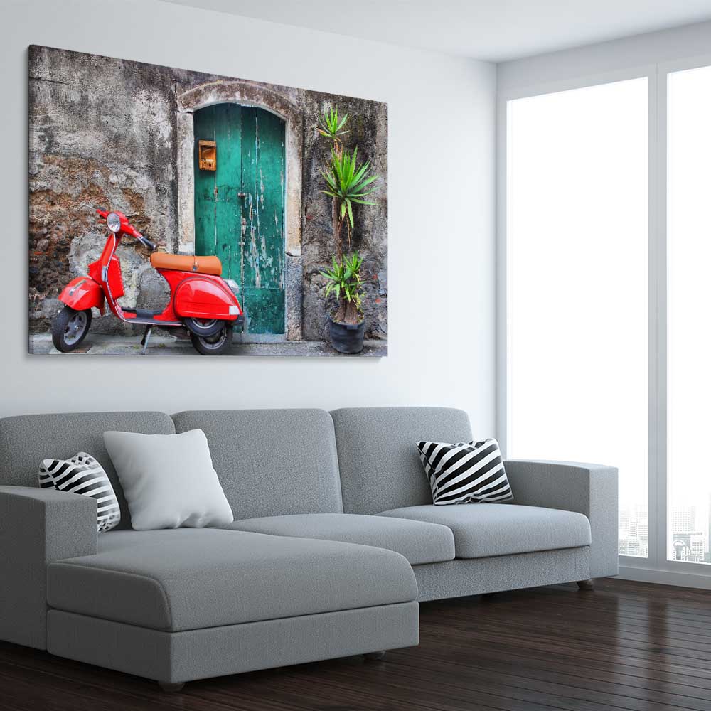 Vintage Red Scooter stretched canvas displayed from an angle in a room is a high quality print in our city skyline, travel prints and maps collection