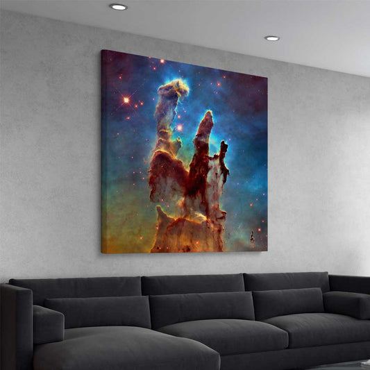 Space prints and wall art of Pillars of Creation on a stretched canvas displayed from an angle in a room