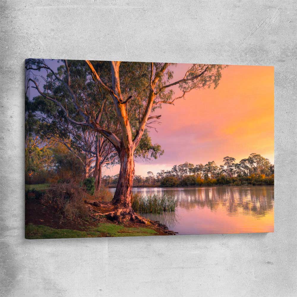 Floral print of Blissful River Sunset on a stretched canvas