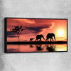 Animal wall art and canvas prints of Elephant Family Dawn with black framed canvas