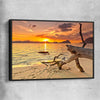 Beach and coastal wall art print of Driftwood at Sunset with black framed canvas