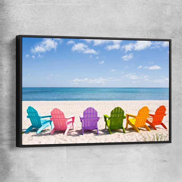 Beach and coastal wall art print of Pastel Chairs with black framed canvas