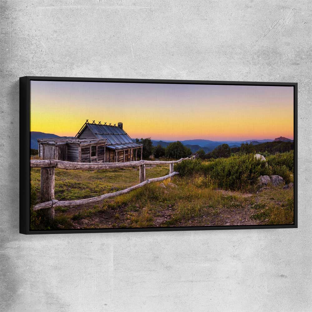 Floral print of Craigs Hut at Sunset with black framed canvas