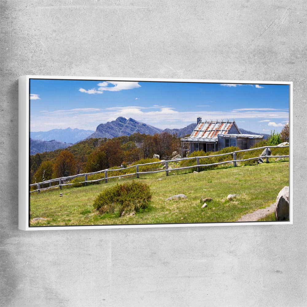 Floral print of Victorian Alps Craigs Hut with white framed canvas