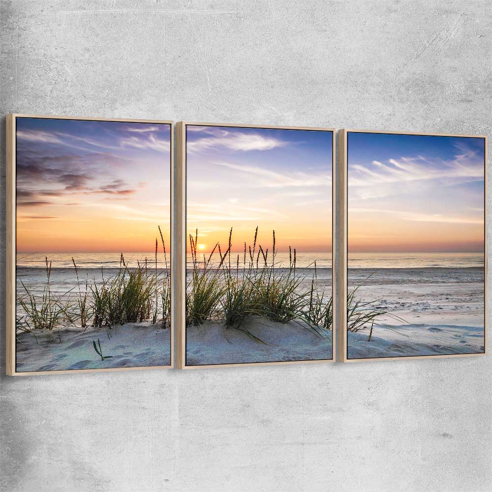 Beach and coastal wall art print of Calming Sunset Set with raw oak framed canvas