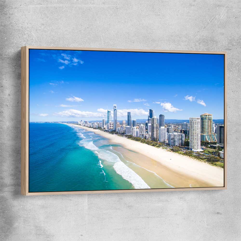 Beach and coastal wall art print of Coastal Skyline View with raw oak framed canvas