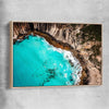 Beach and coastal wall art print of Crystal Clear Tides with raw oak framed canvas