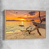 Beach and coastal wall art print of Driftwood at Sunset with raw oak framed canvas