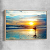 Beach and coastal wall art print of Last Surf at Sunset with raw oak framed canvas