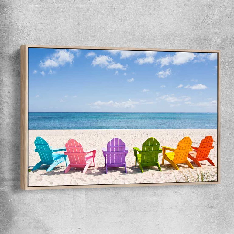Beach and coastal wall art print of Pastel Chairs with raw oak framed canvas
