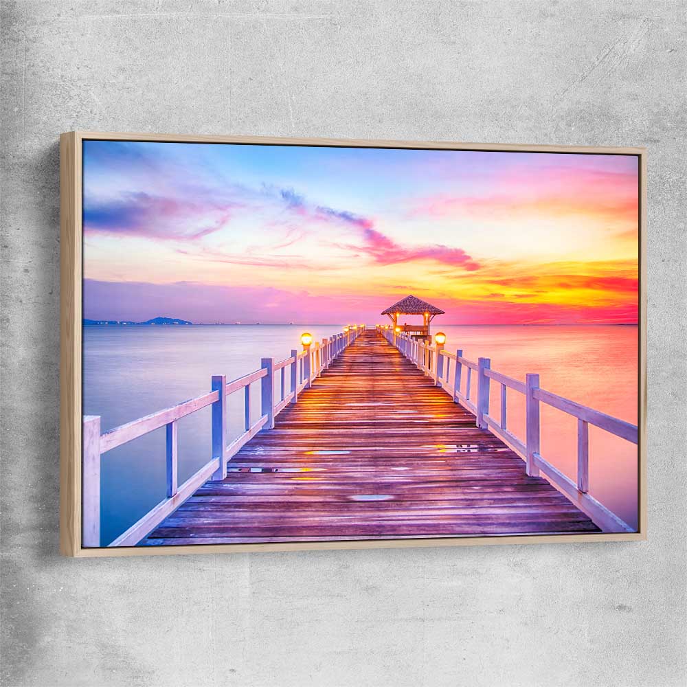 Beach and coastal wall art print of Walking Into Stillness with raw oak framed canvas