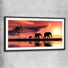 Animal wall art and canvas prints of Elephant Family Dawn with black glass front frame