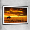 Animal wall art and canvas prints of Savannah Elephant Sunset with black glass front frame