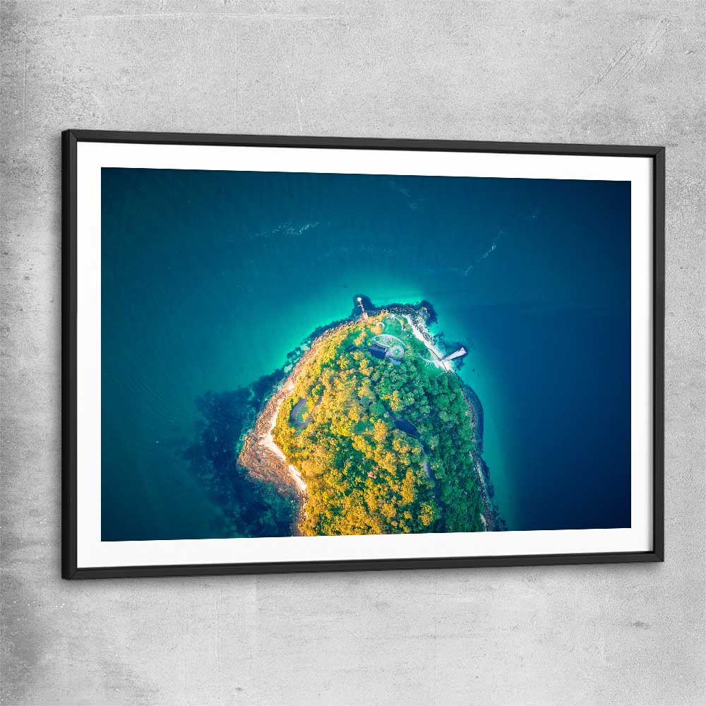 Beach and coastal wall art print of Bradleys Head Aerial with black glass front frame