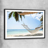 Beach and coastal wall art print of Seychelles Hammock with black glass front frame