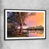 Floral print of Blissful River Sunset with black glass front frame