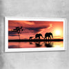 Animal wall art and canvas prints of Elephant Family Dawn with white glass front frame