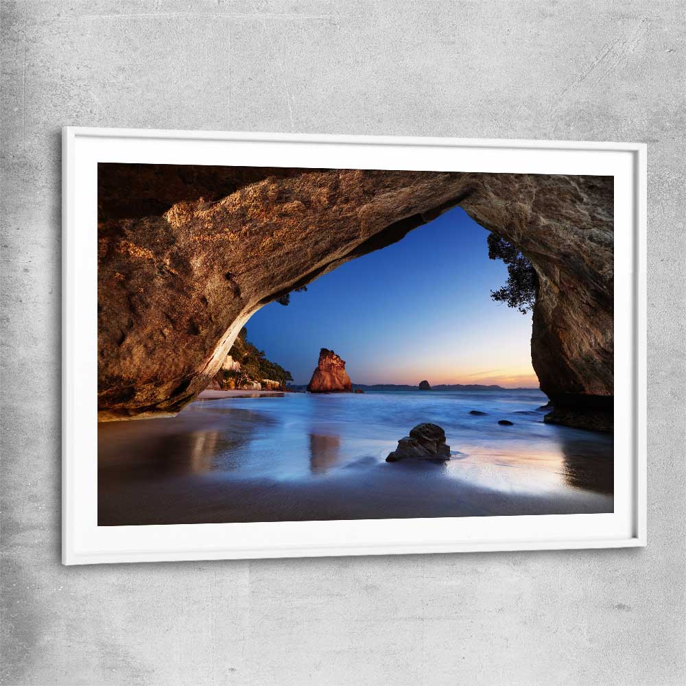 Beach and coastal wall art print of Cathedral Cove New Zealand with white glass front frame