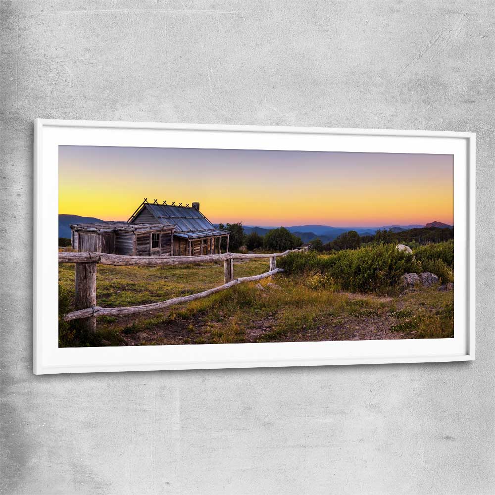 Floral print of Craigs Hut at Sunset with white glass front frame