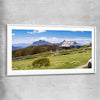Floral print of Victorian Alps Craigs Hut with white glass front frame
