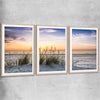 Beach and coastal wall art print of Calming Sunset Set with raw oak glass front frame