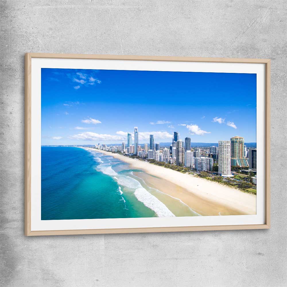 Beach and coastal wall art print of Coastal Skyline View with raw oak glass front frame