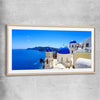 Beach and coastal wall art print of Santorini Cliffside with raw oak glass front frame
