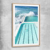 Beach and coastal wall art print of Bondi Iceberg with raw oak glass front frame