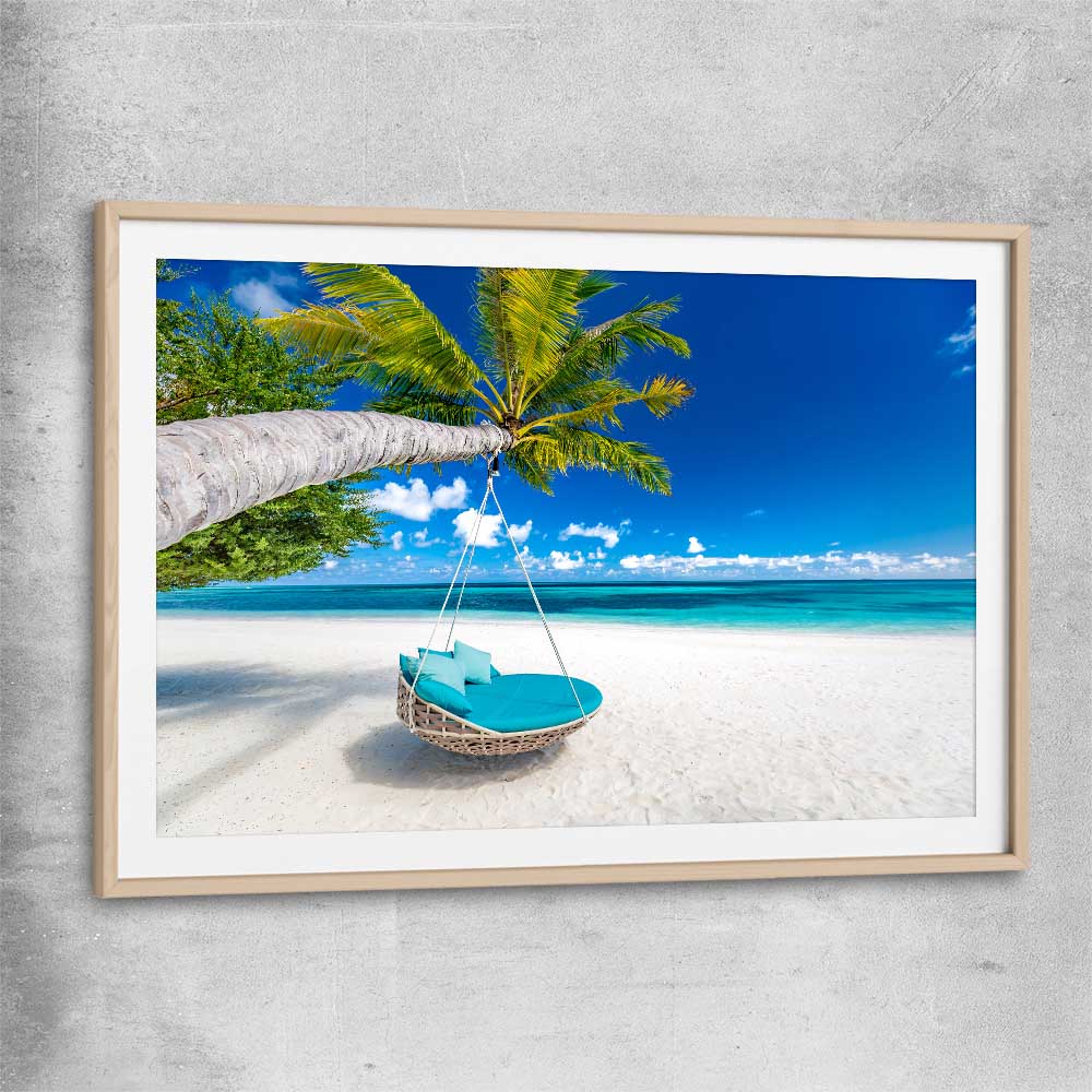 Beach and coastal wall art print of Paradise Swing with raw oak glass front frame
