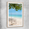Beach and coastal wall art print of Pristine Beach Swing with raw oak glass front frame