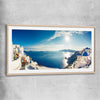 Beach and coastal wall art print of Santorini Panorama with raw oak glass front frame