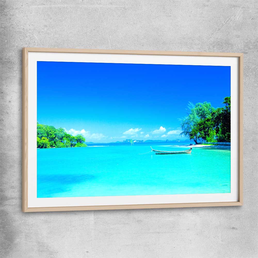Beach and coastal wall art print of Serene Island Waters with raw oak glass front frame