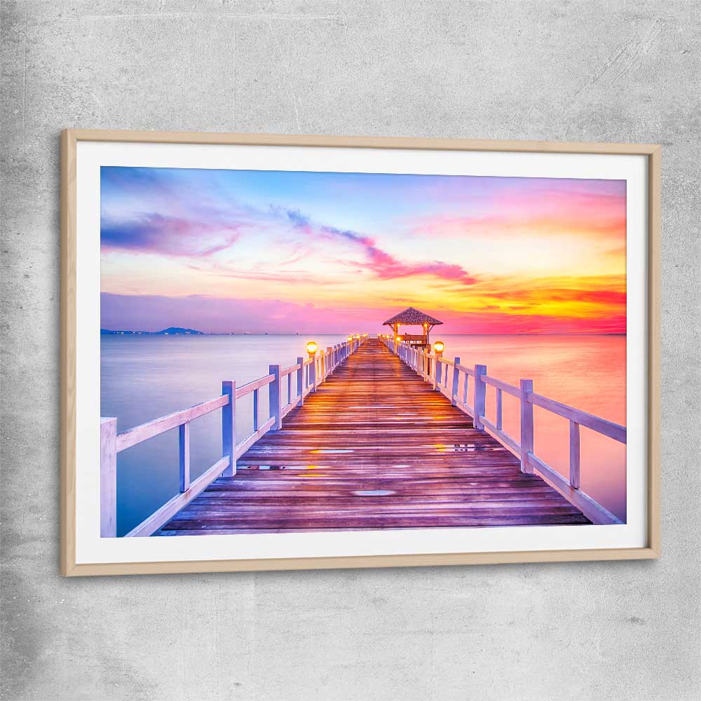 Beach and coastal wall art print of Walking Into Stillness with raw oak glass front frame