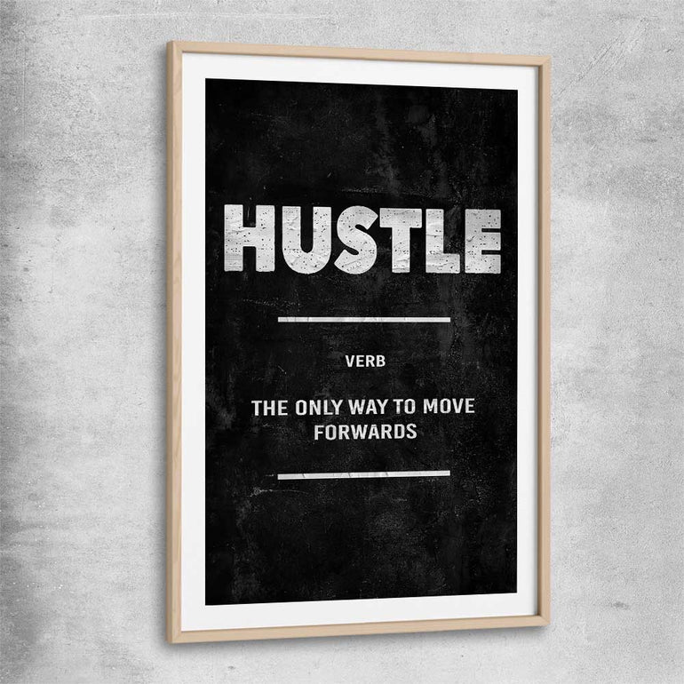 Inspirational wall art print of Hustle Definition with raw oak glass front frame