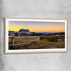 Floral print of Craigs Hut at Sunset with raw oak glass front frame
