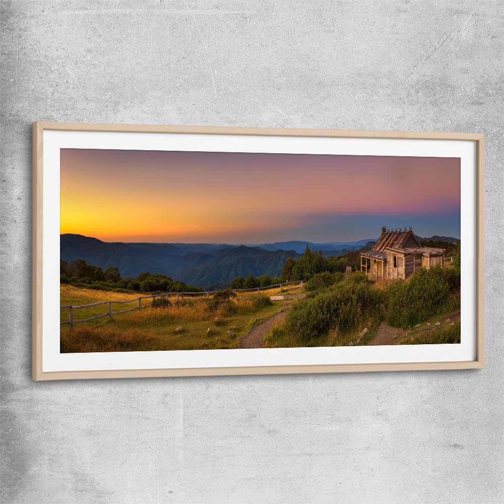 Floral print of Craigs Hut Victorian Alps with raw oak glass front frame