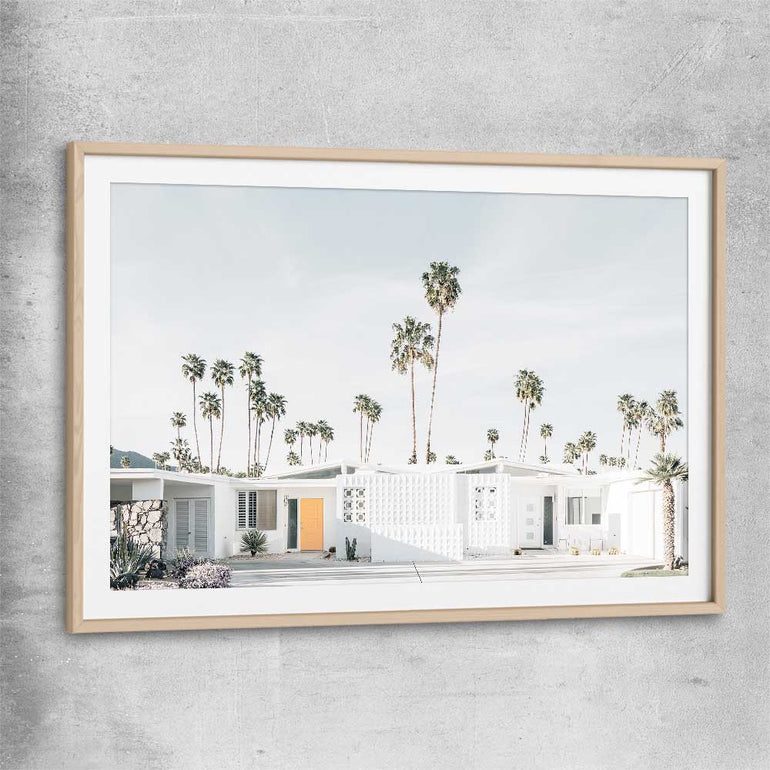 Floral print of Palm Springs with raw oak glass front frame