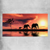 Animal wall art and canvas prints of Elephant Family Dawn on a rolled print