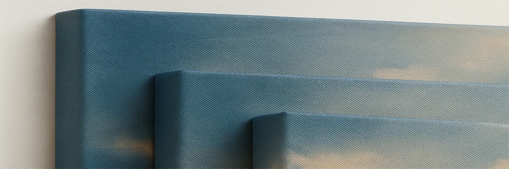 Close-up of a textured canvas surface with a subtle blue pattern